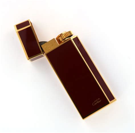 prezzo accendino oro cartier|Accendino d'oro Cartier .